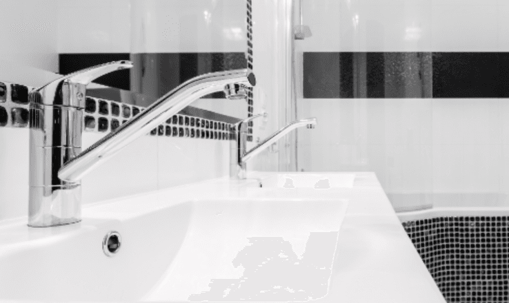 Silver sink in grey and white bathroom